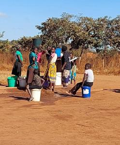 villagers at the Franke well